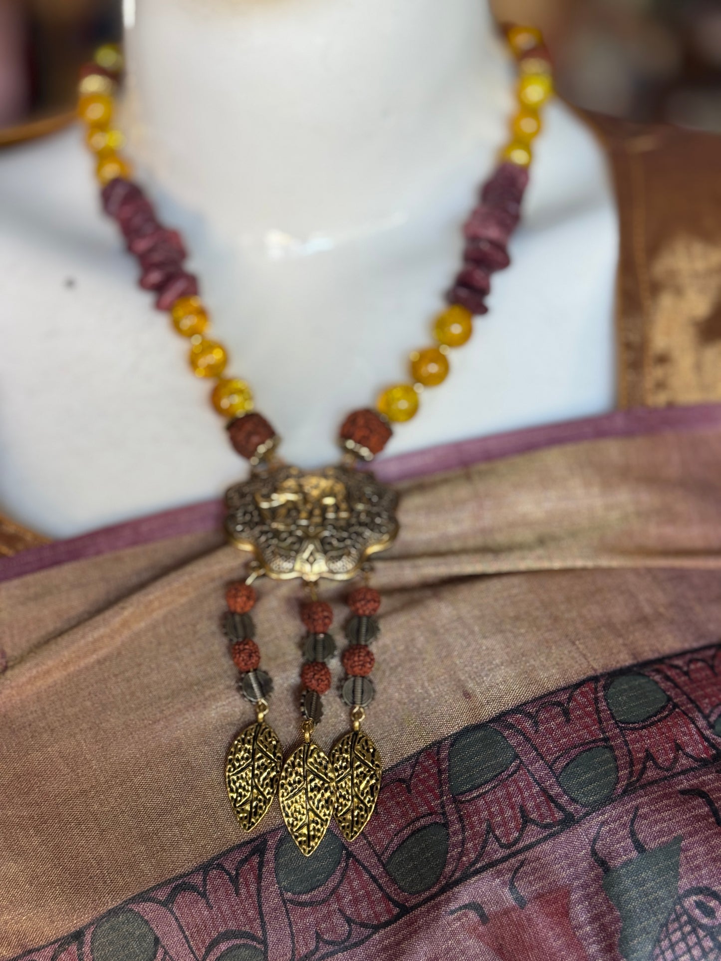 Rudraksha Neckpiece with Elephant pendant, leaf drops and earrings set