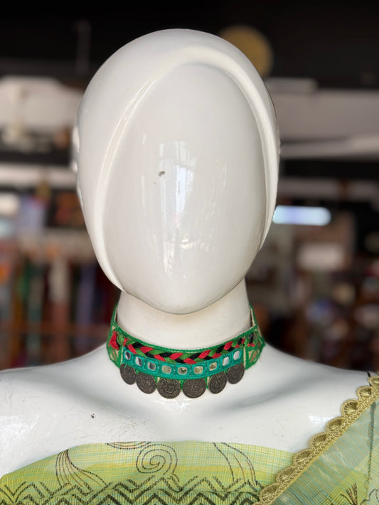 Green handcrafted choker neckpiece with mirrors embroidery and oxidized silver coins