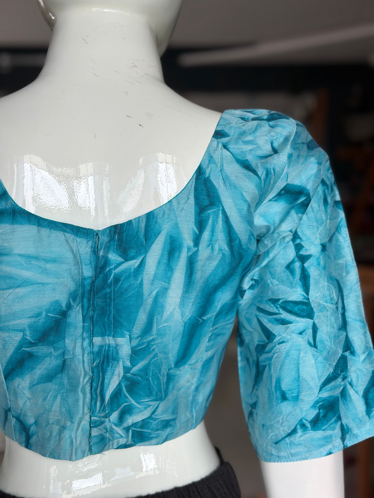 Blue crushed cotton back open blouse with elbow sleeves