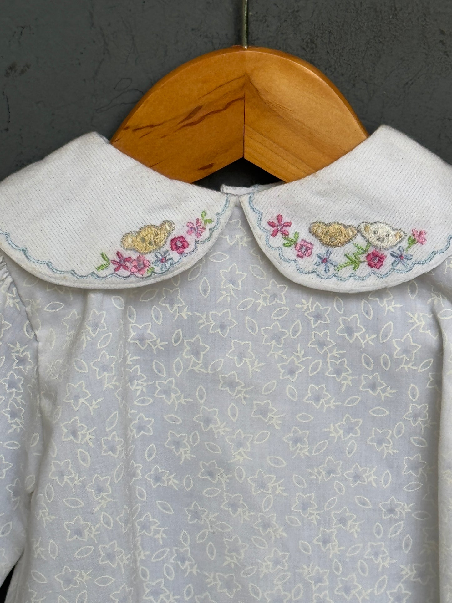 White embroidered Peter Pan collared cotton baby frock with cute embroidery