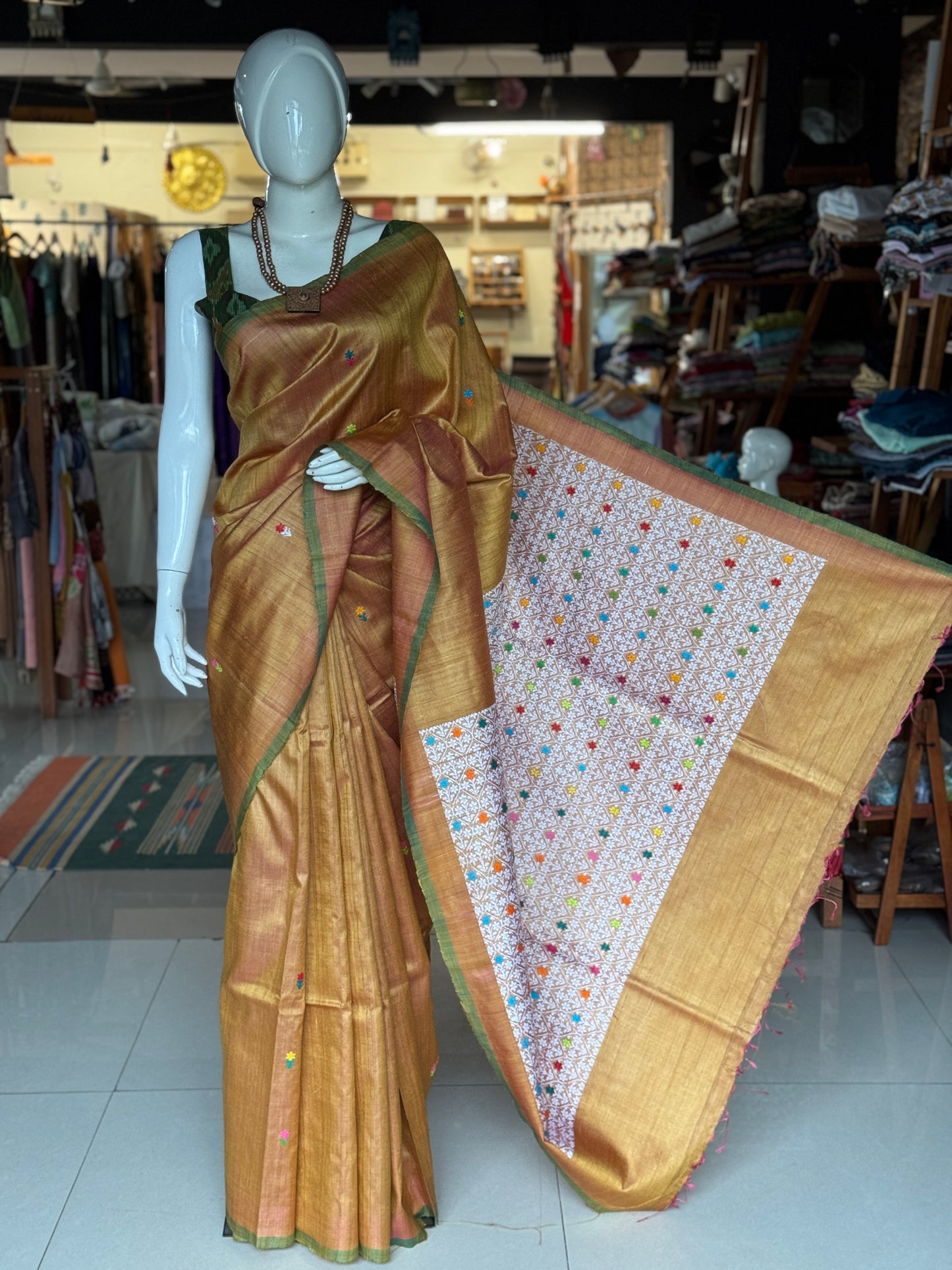 Golden tone pure tussar silk handwoven saree with extra weft flower butis and jala palla