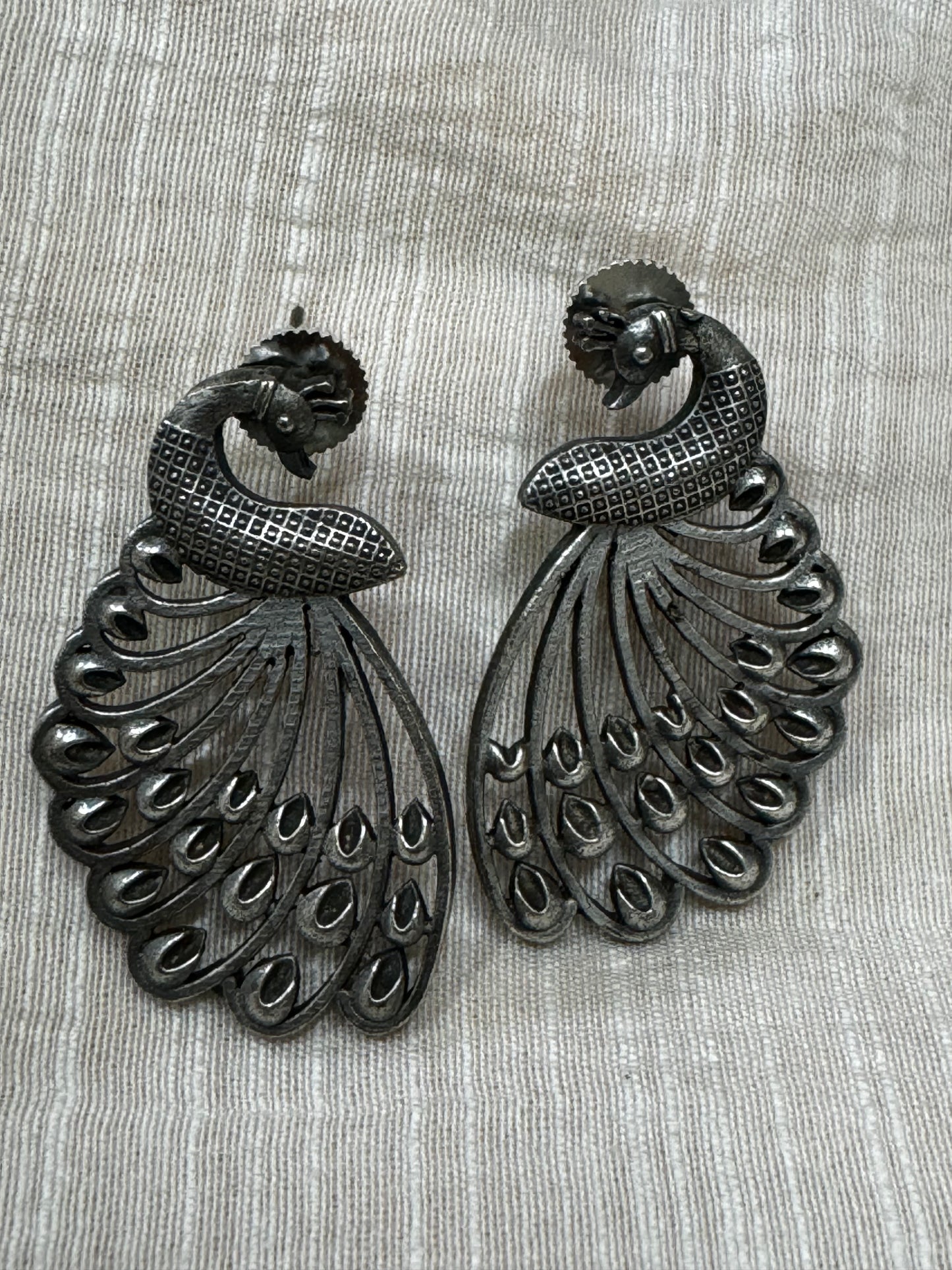 Dancing peacock stud earrings