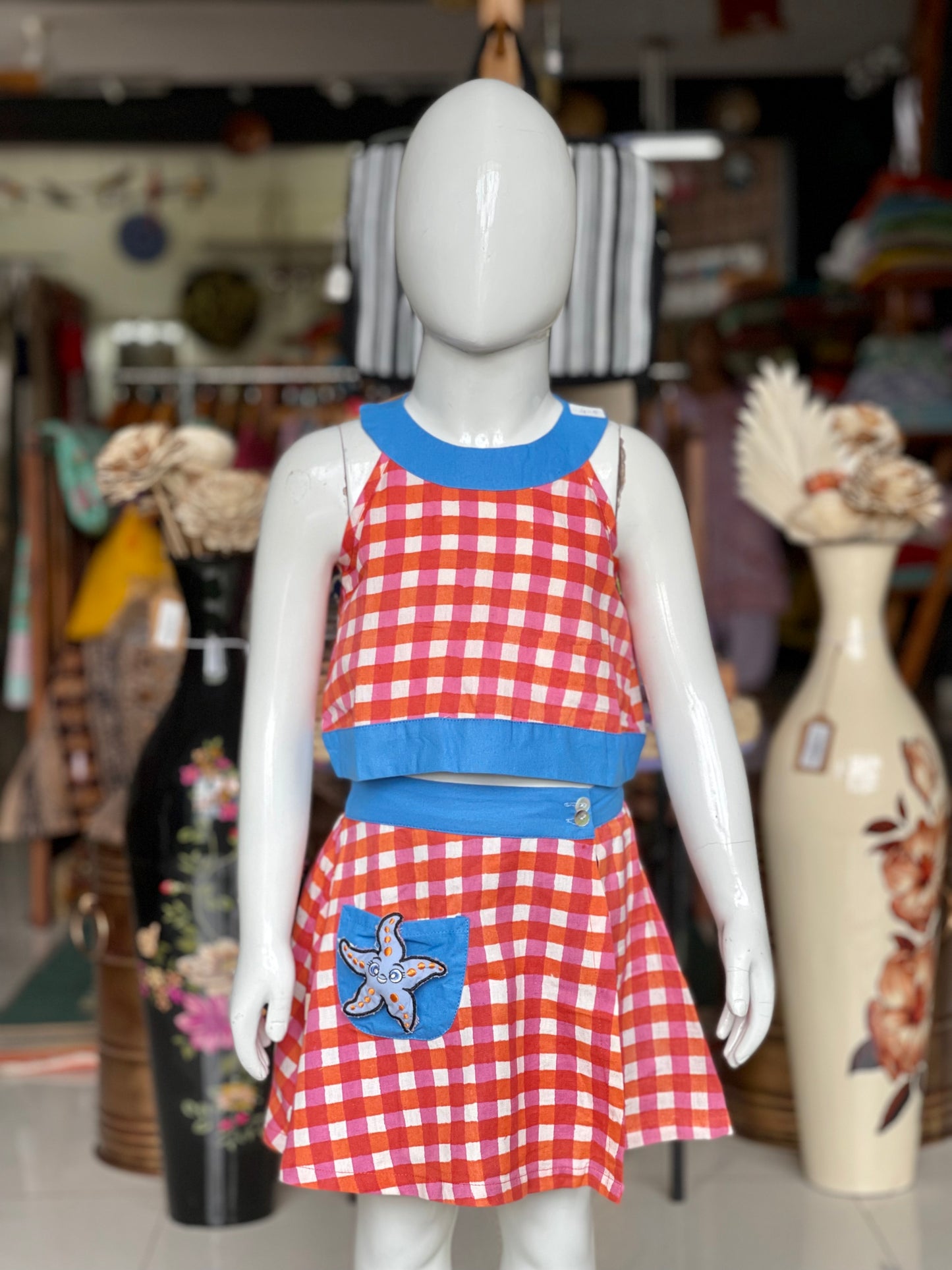 Orange and blue handloom cotton checks halter neck top with divided shorts style skirt for girls