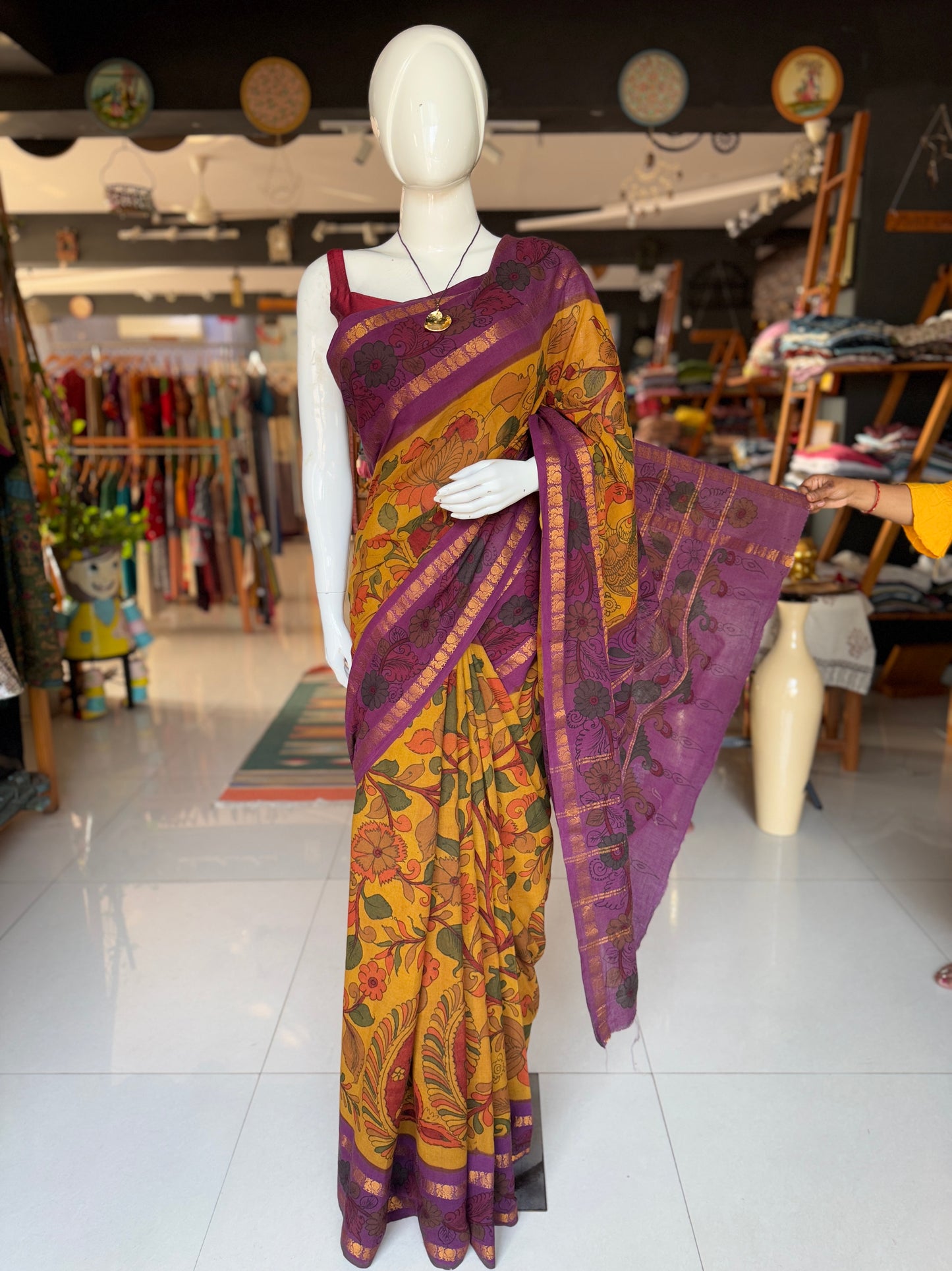 Mustard and purple floral design hand painted pen Kalamkari cotton saree