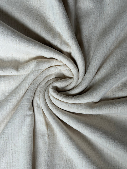 Off white kora cotton hand spun, hand woven fabric with missing thread stripes weave