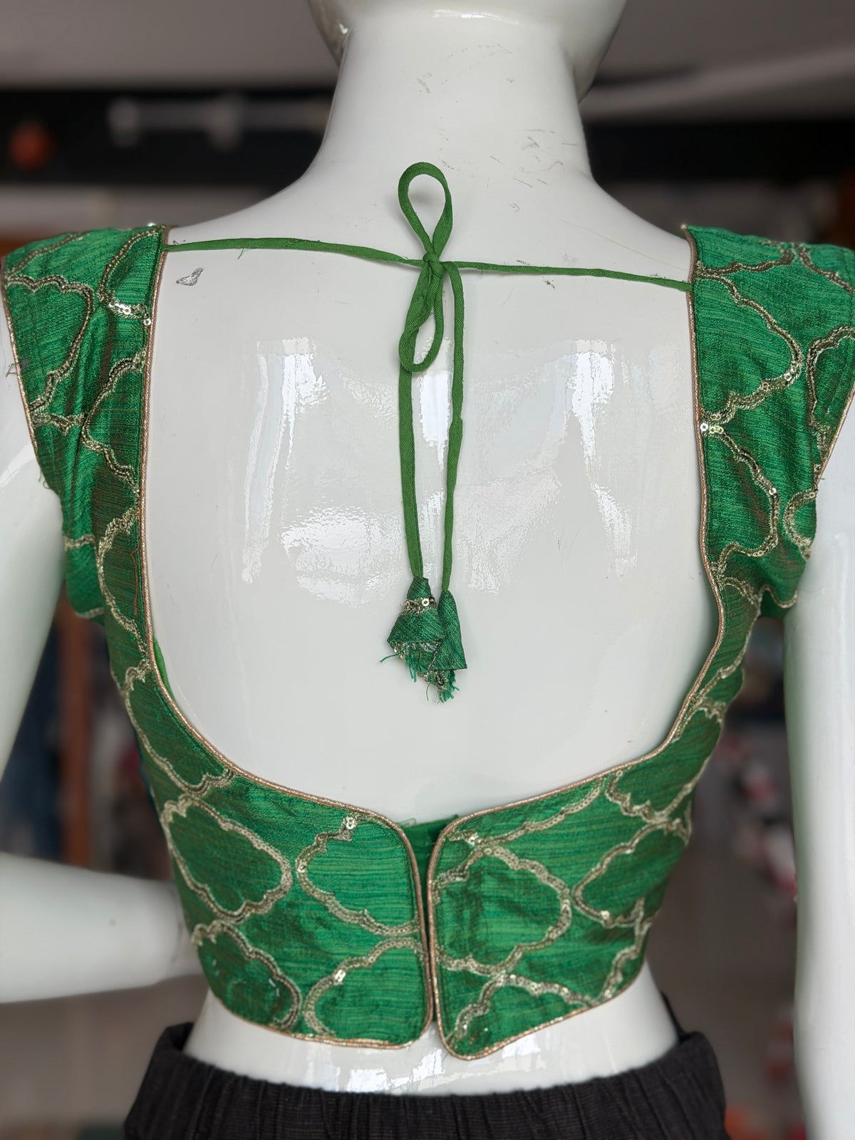 Green sleeveless raw silk blouse with sequin embroidery- back open