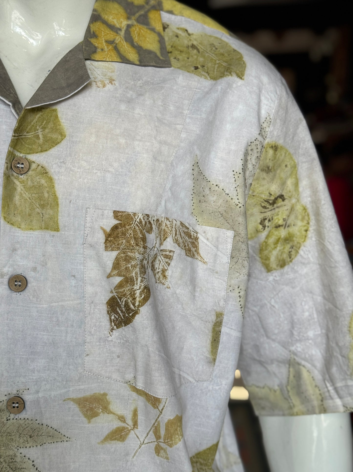 Off white eco friendly leaf printed cotton half sleeves loose fit shirt for men