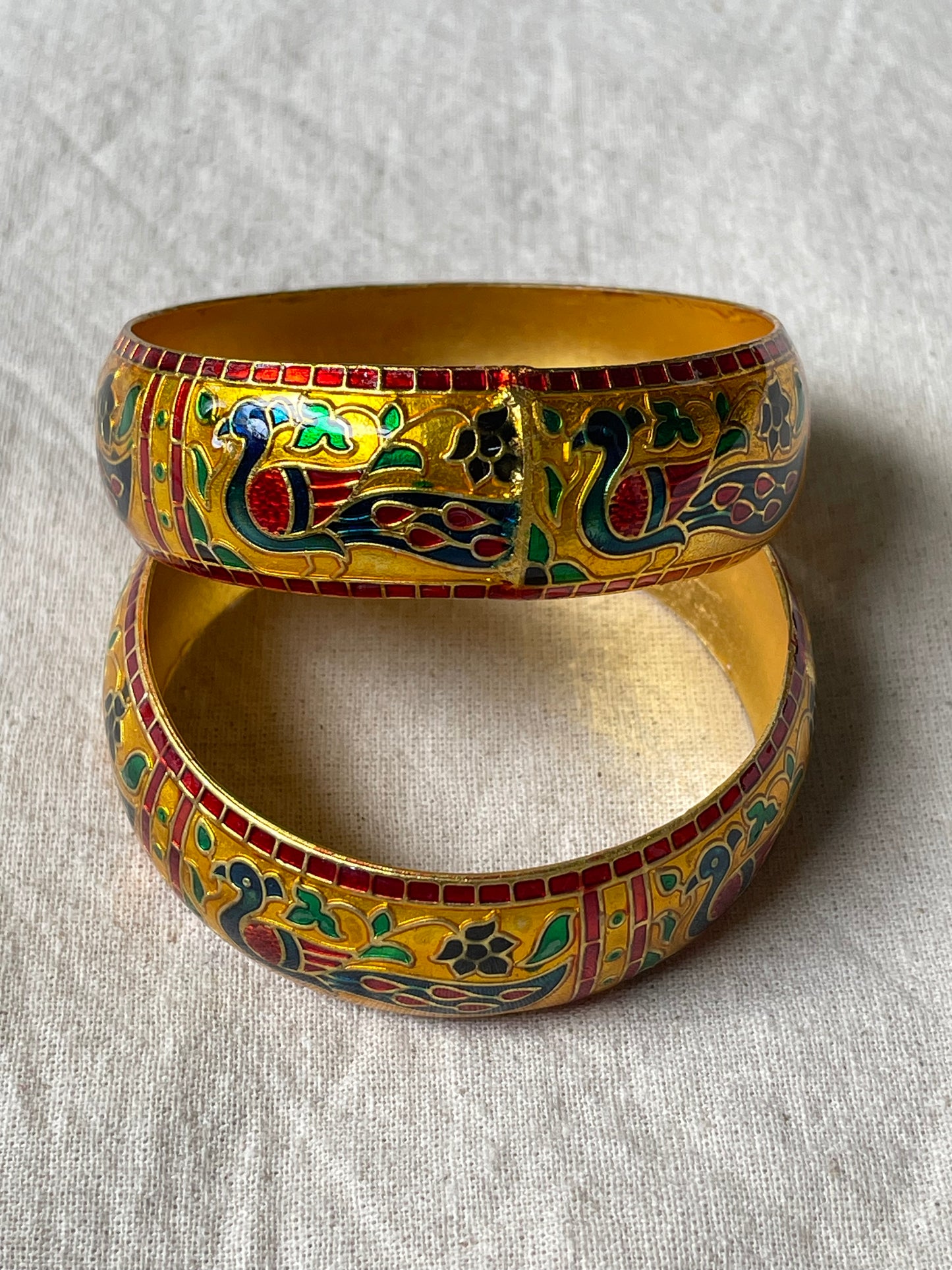 Lacquer enamel bangles pair with peacock motifs