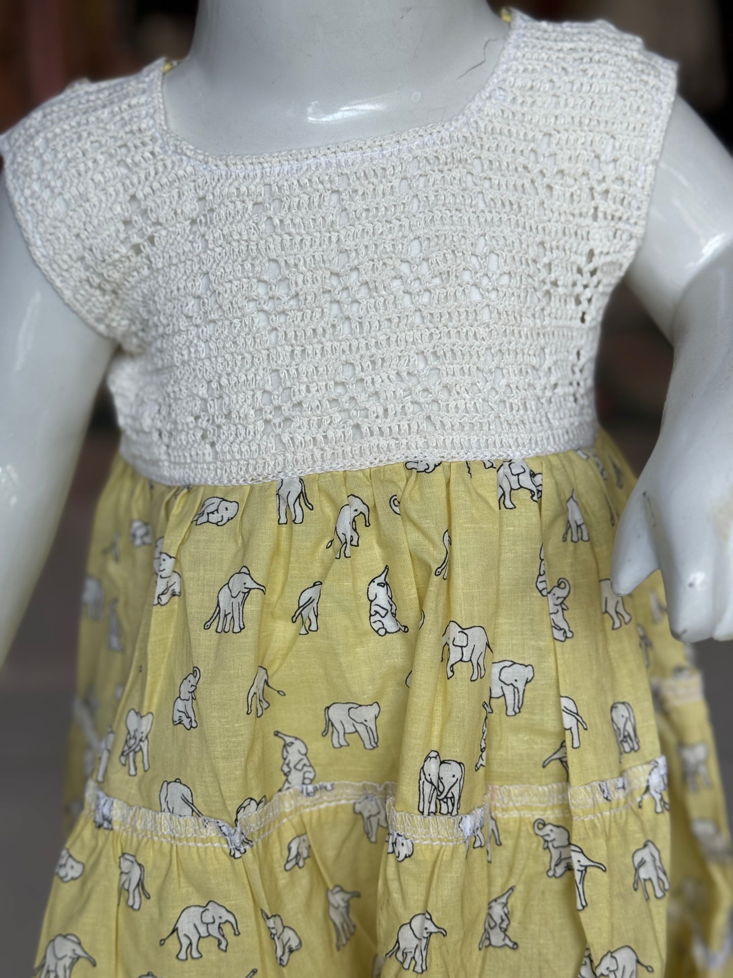 Tiered hand block printed cotton frock with crochet yoke for girls