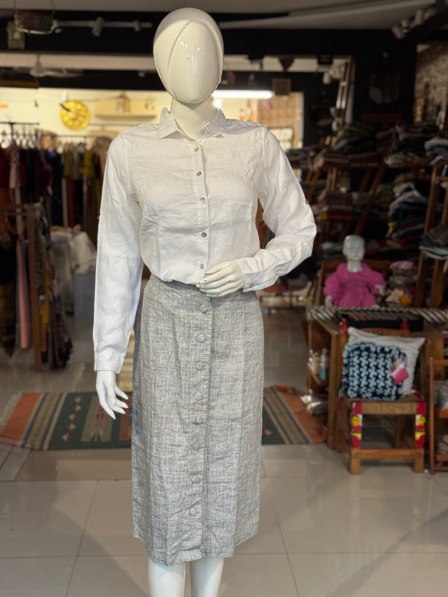 Women’s formal calf length skirt with elastic waist and front buttons - colors available