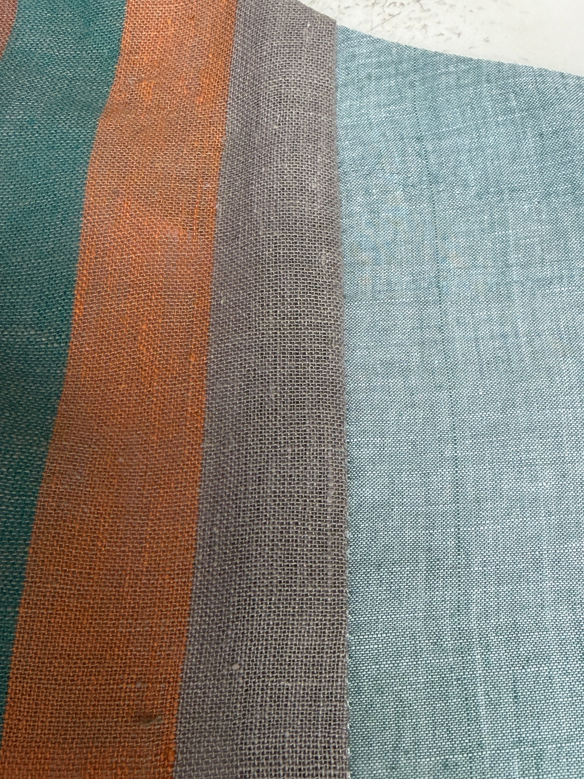 Green handloom cotton dress with hand woven kala cotton stripes on one side