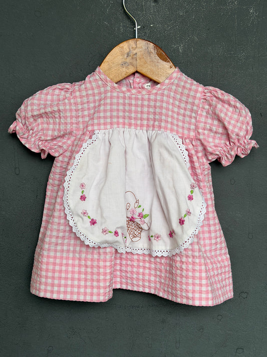 Pastel pink cotton frock for girls with white embroidered front flap