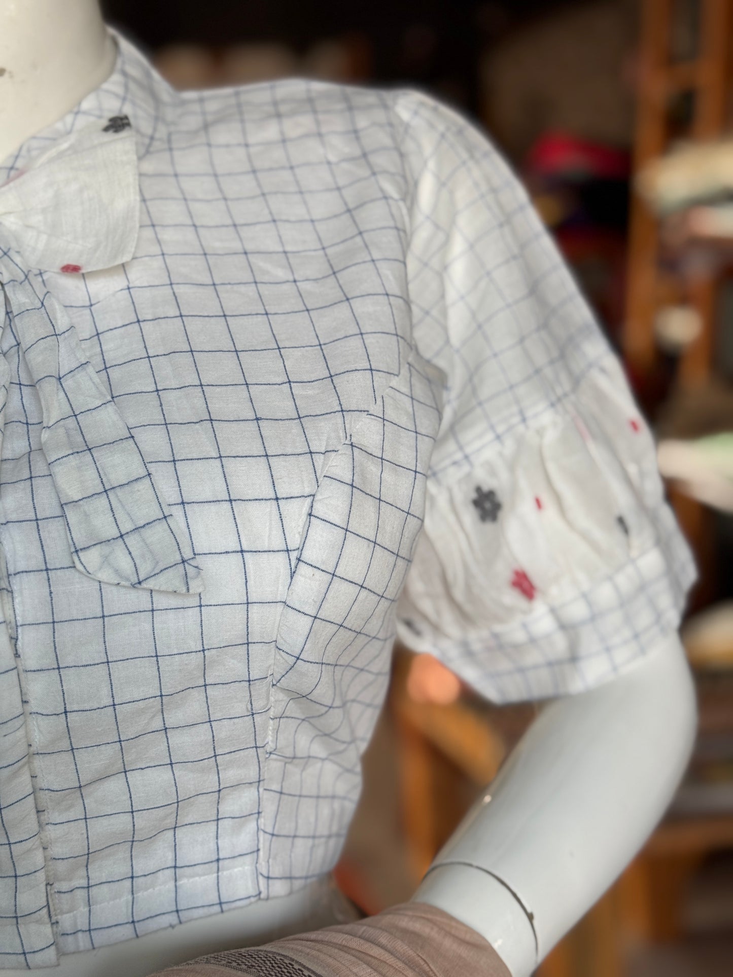 White n blue checks hand woven cotton Jamdani blouse with elbow length balloon sleeves and bow neck