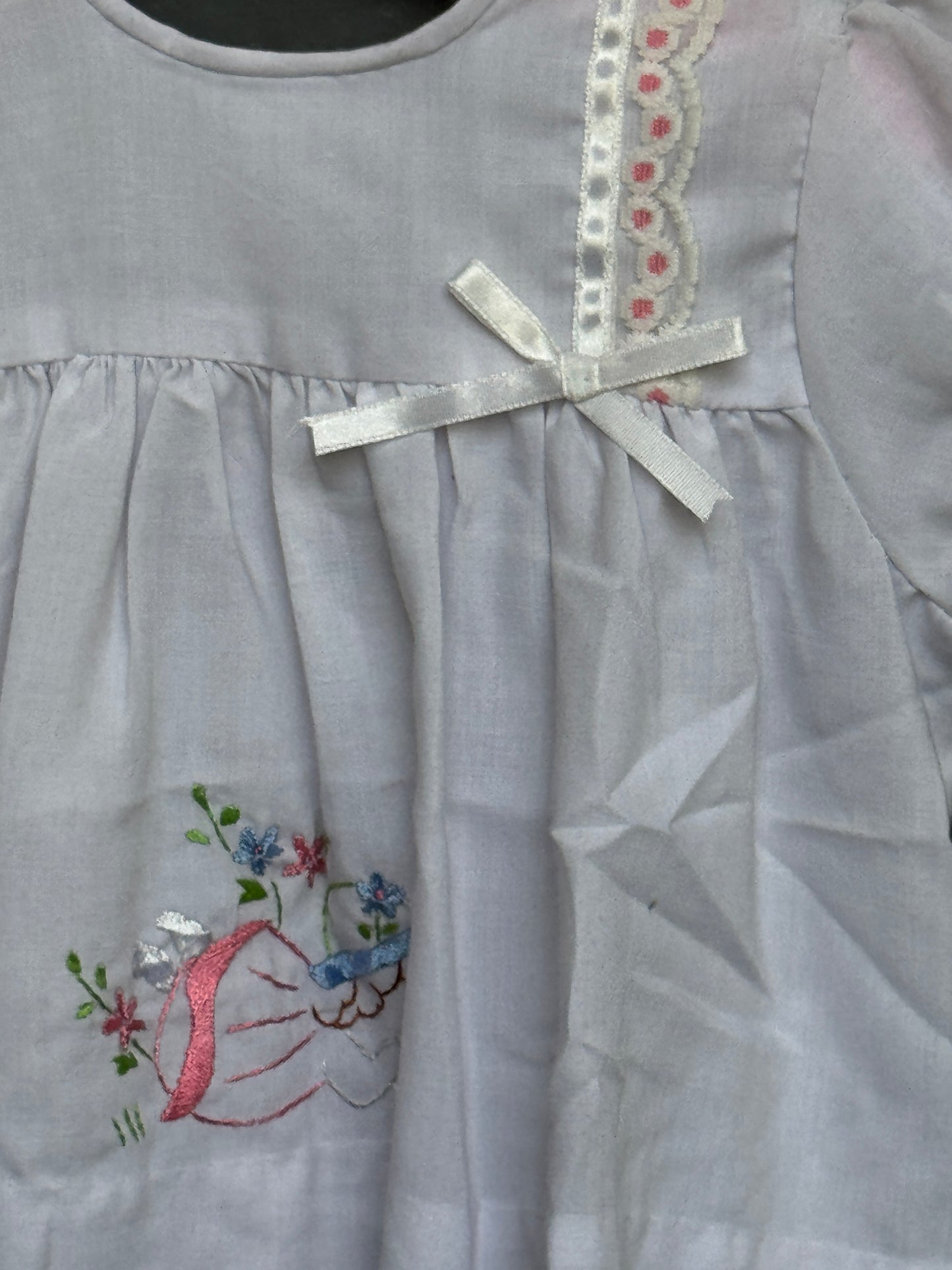 White embroidered cotton frock with cute girl embroidery
