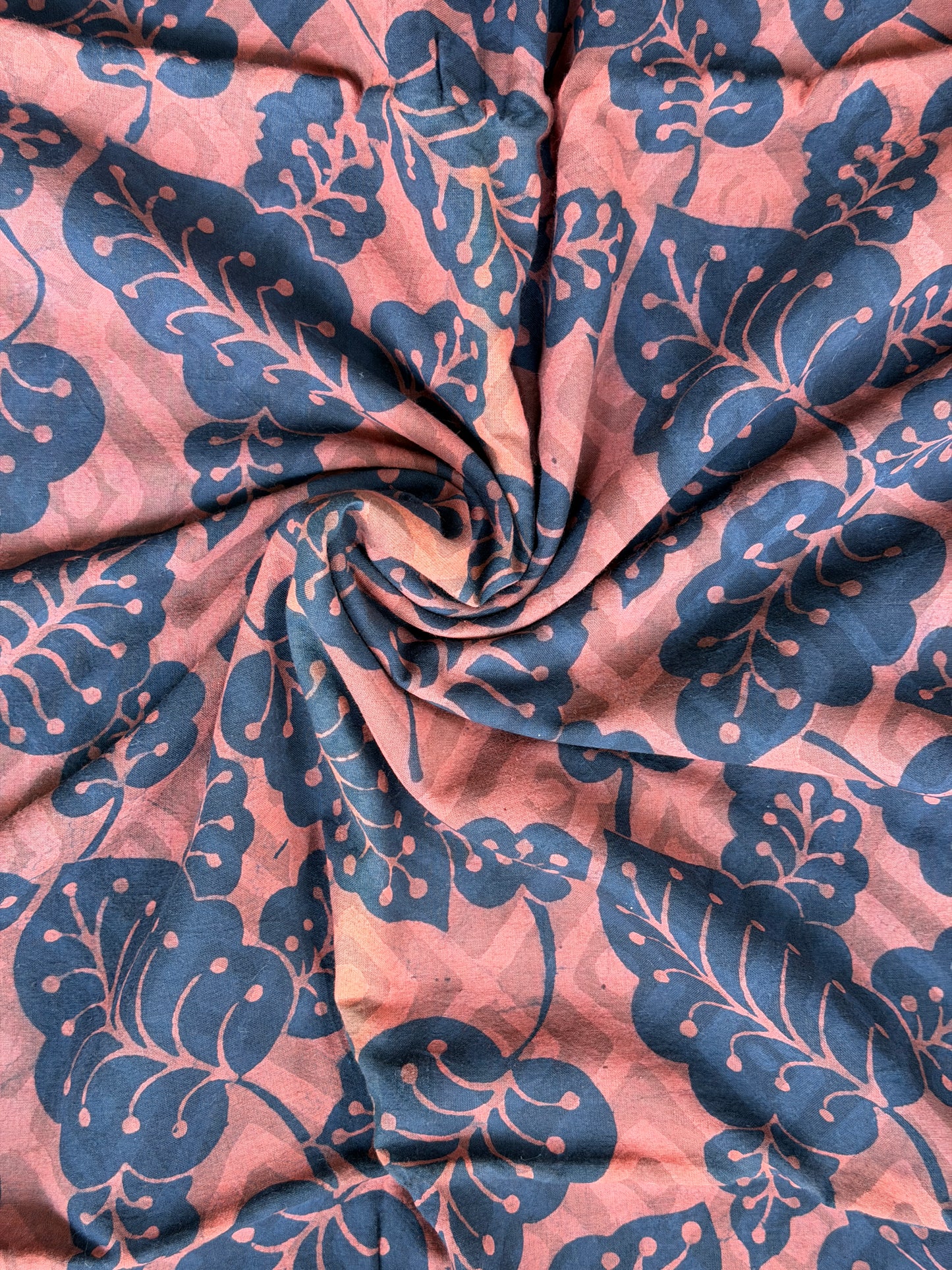 Blue leaves on light brown base hand block printed cotton fabric - double dabu print