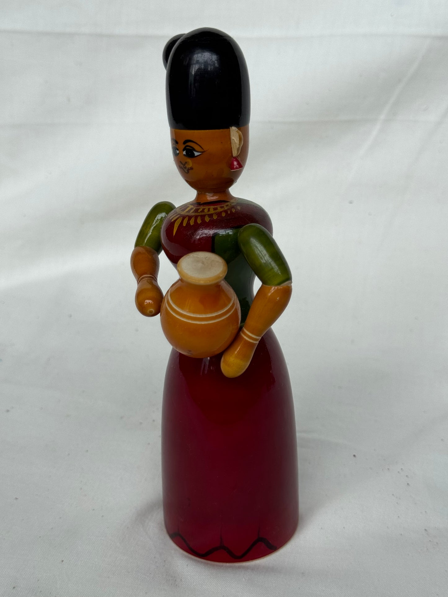 Lady with side bun and carrying pot - Etikoppaka Wooden handicraft decor