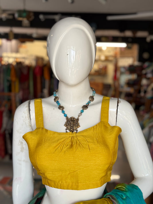 Yellow strap sleeves back open silk blouse