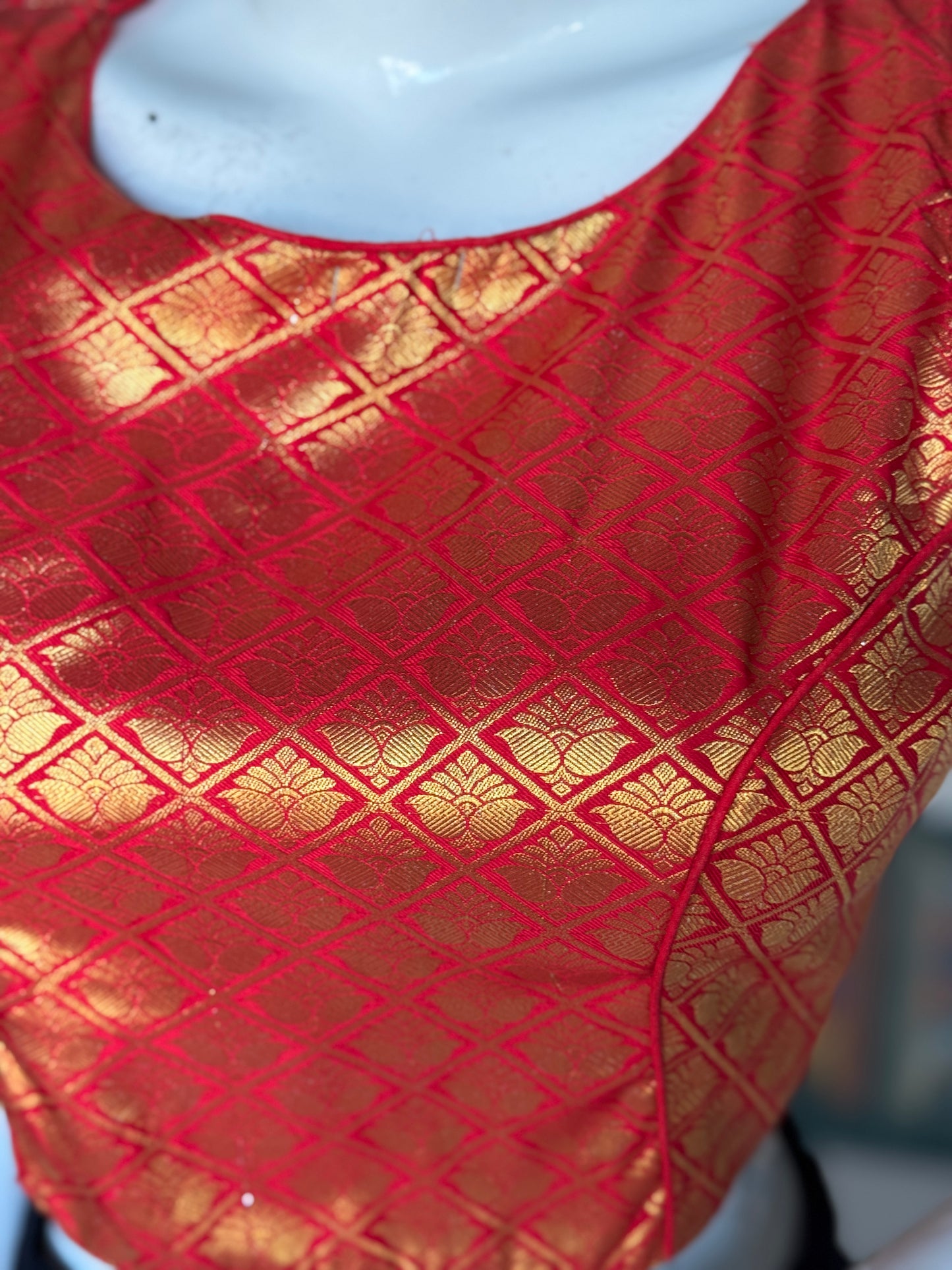 Red and gold brocade sleeveless blouse with high back