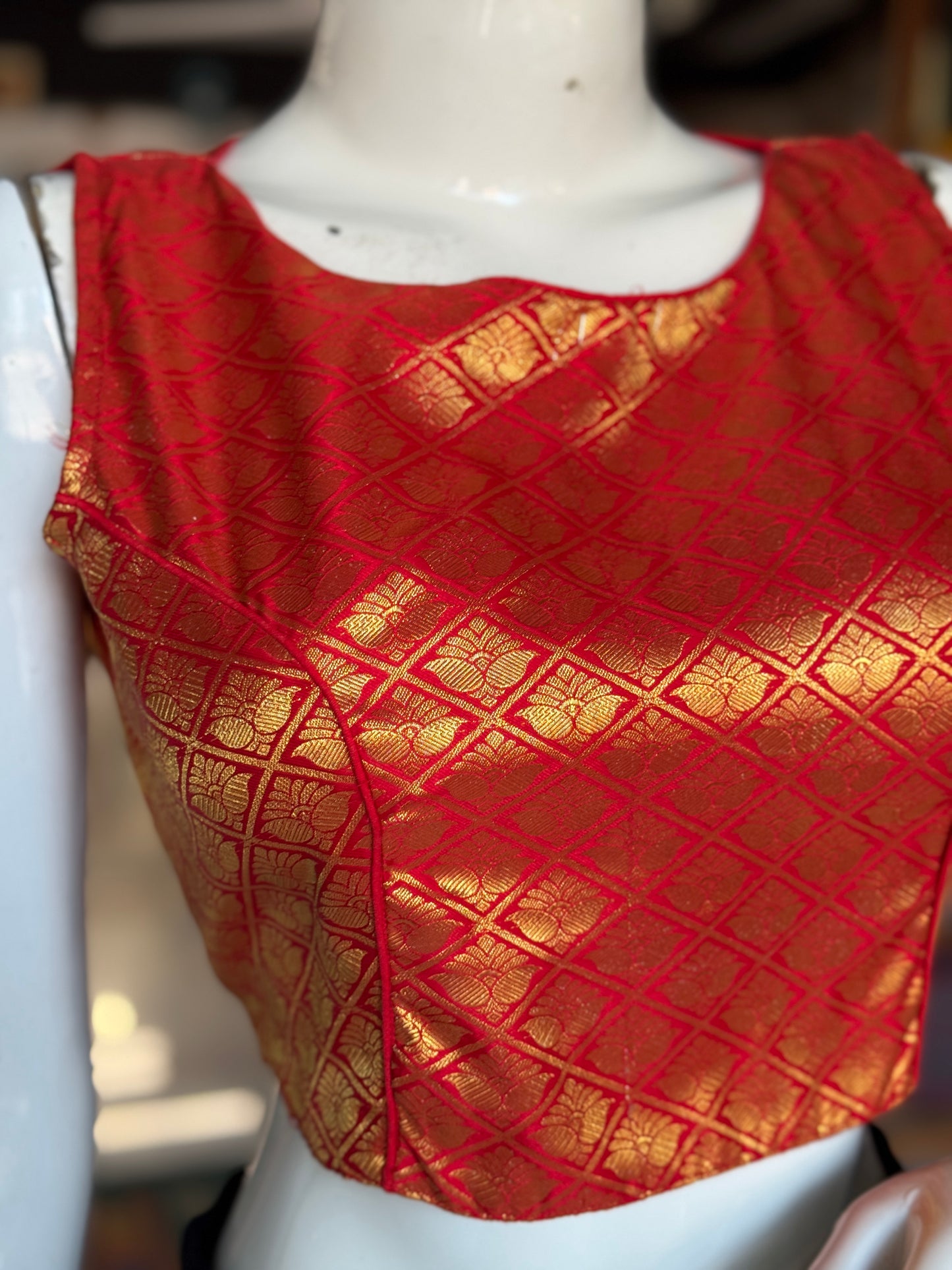 Red and gold brocade sleeveless blouse with high back