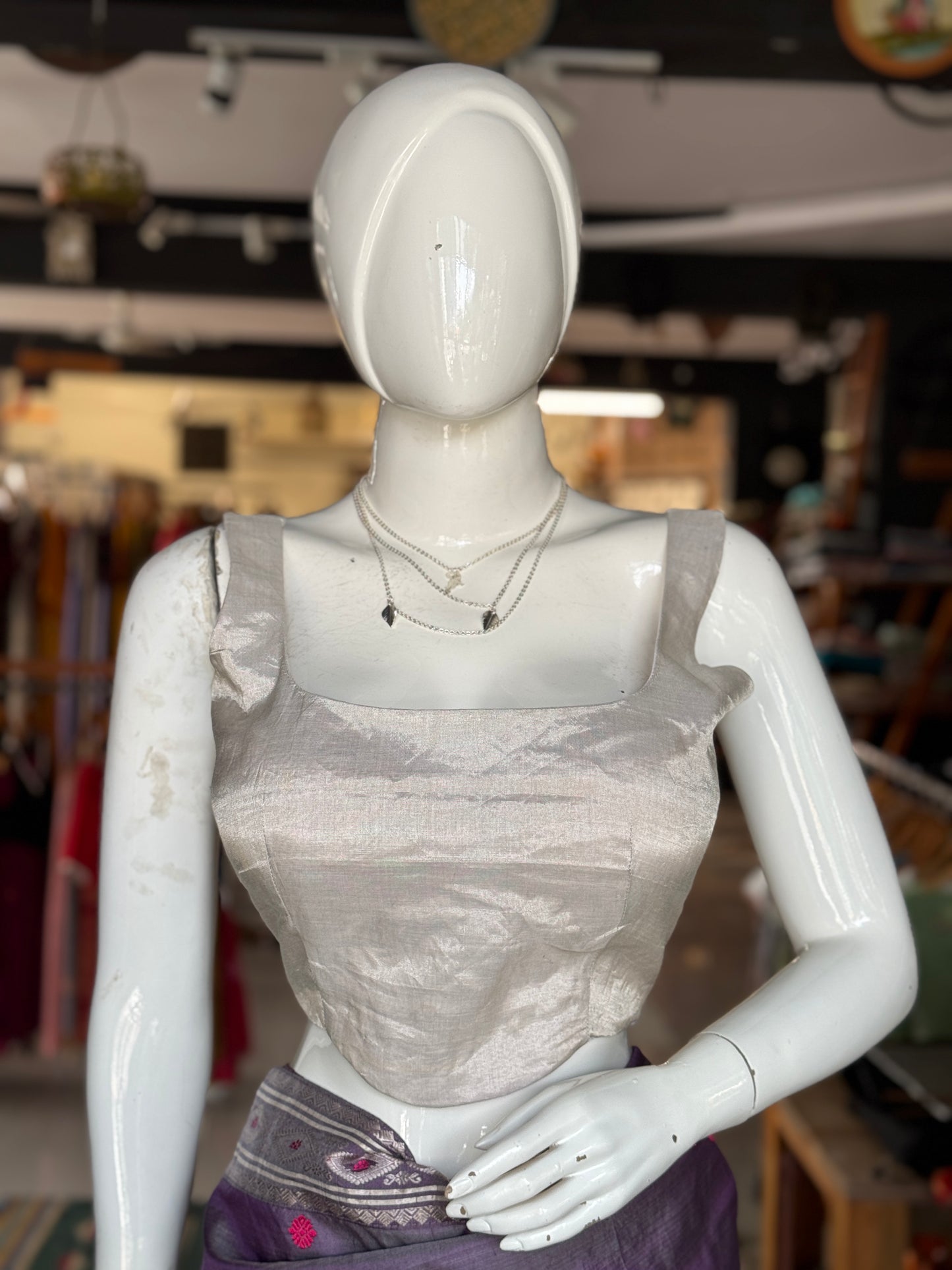 Silver tissue silk Chanderi handloom sleeveless blouse with wide neckline and waist curve