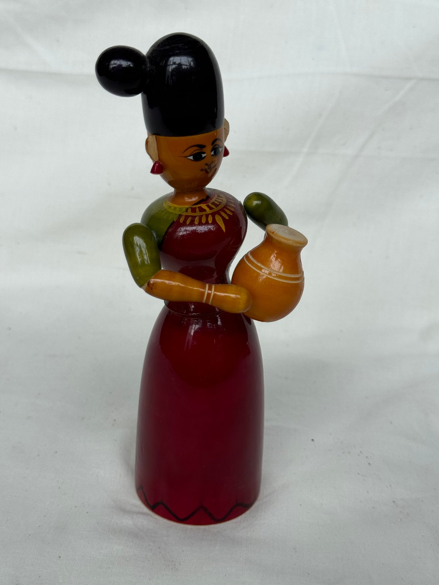 Lady with side bun and carrying pot - Etikoppaka Wooden handicraft decor