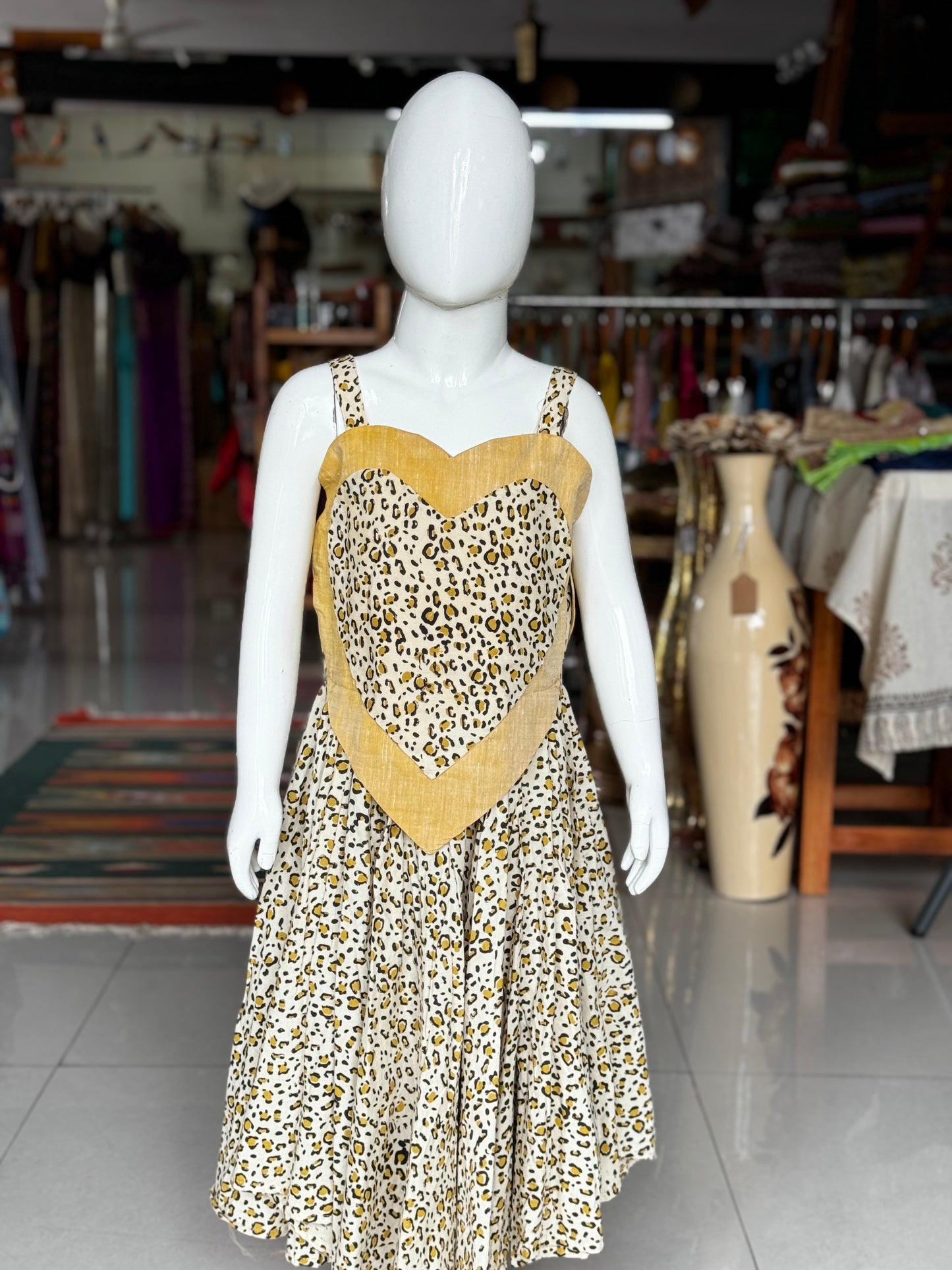 Leopard hand block printed flared umbrella designer frock with layered heart yoke