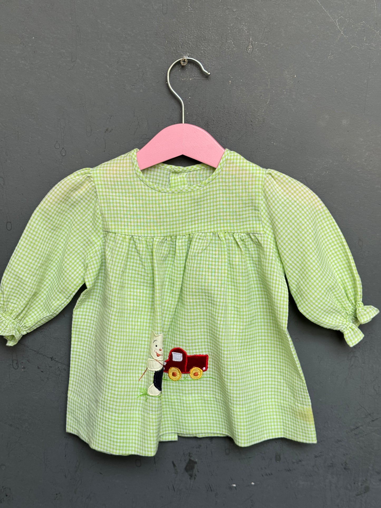 Green checks cotton baby frock with cute embroidery