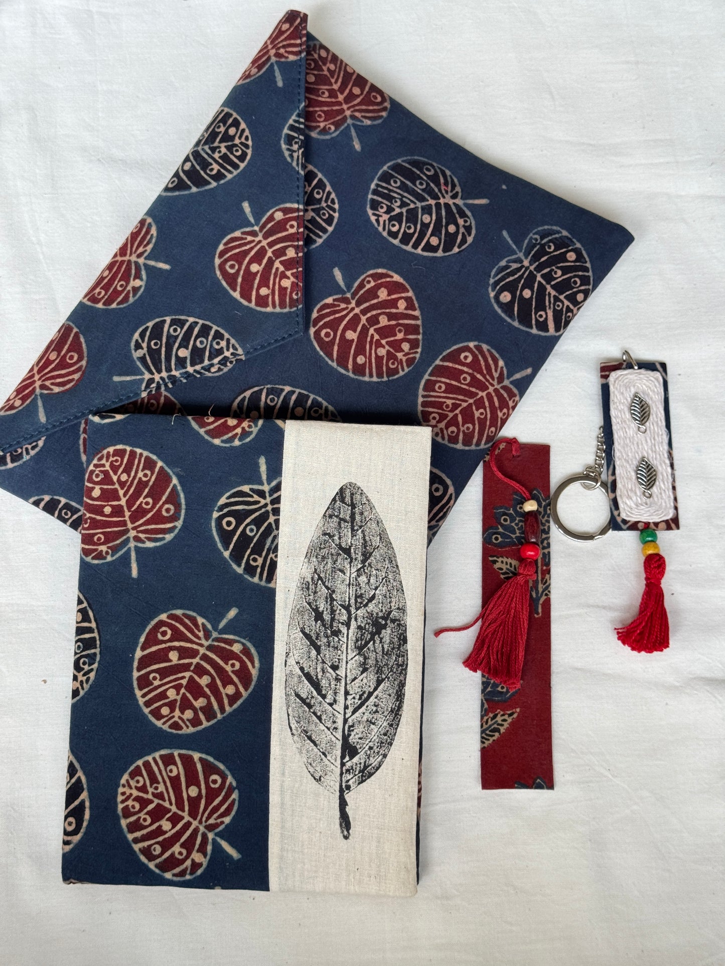 Handmade paper notebook with eco leaf printed fabric cover, hand crafted bookmark, key ring / charm and a container pouch set