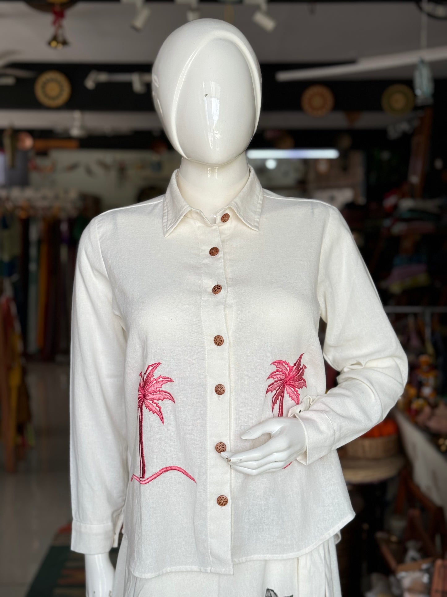 Tree embroidered off white cotton full sleeves shirt for women