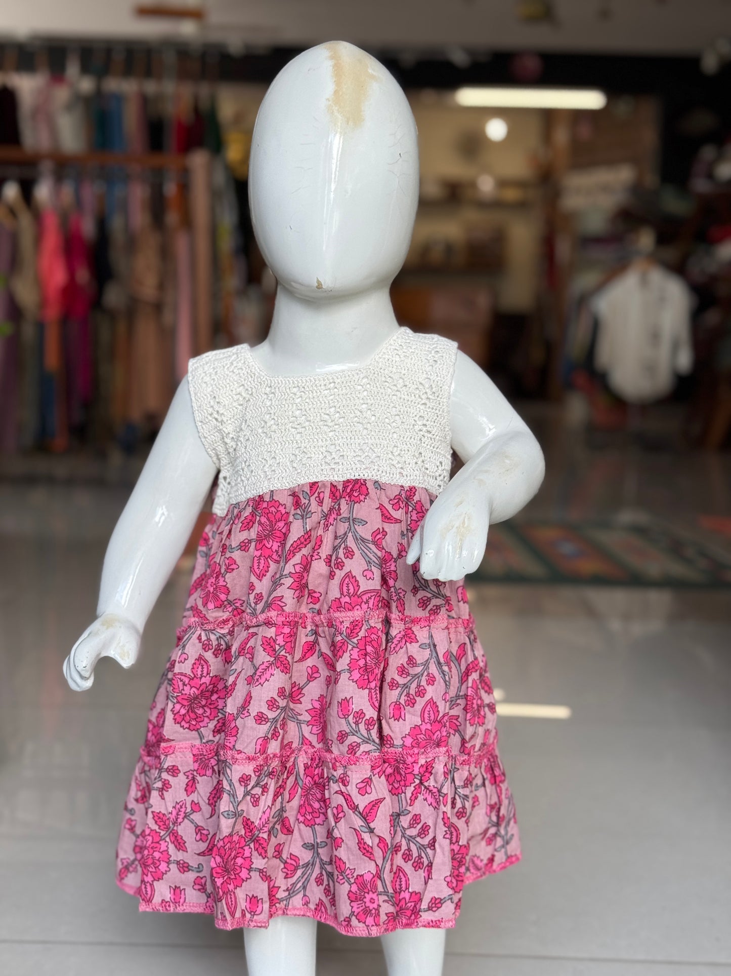 Tiered hand block printed cotton frock with crochet yoke for girls