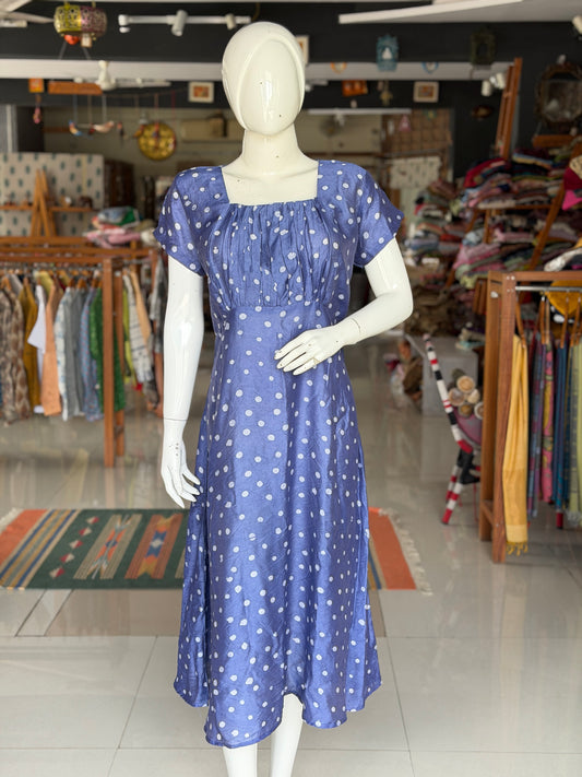 Blue polka dots dress with square neckline and gathered bust