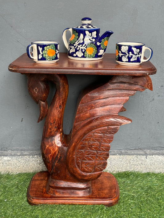 Wooden side / center table with carved swan base and flat top