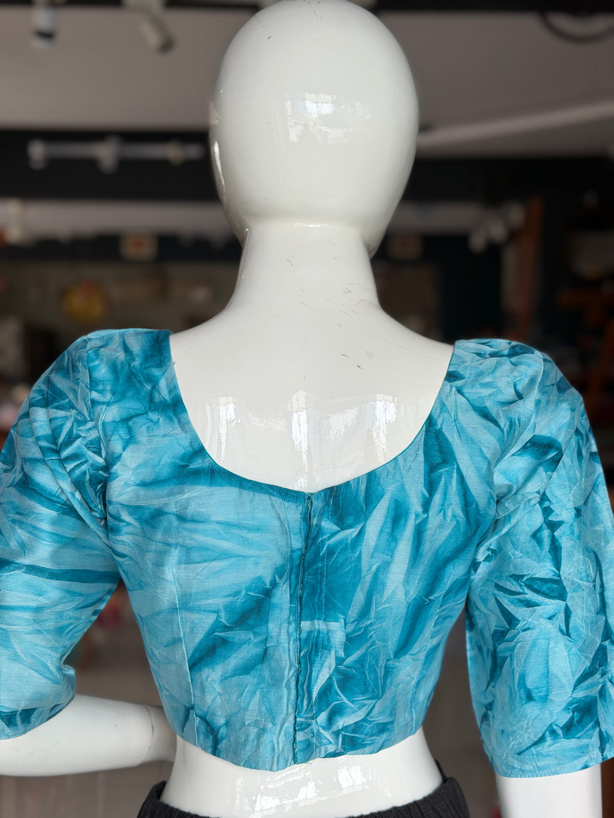 Blue crushed cotton back open blouse with elbow sleeves