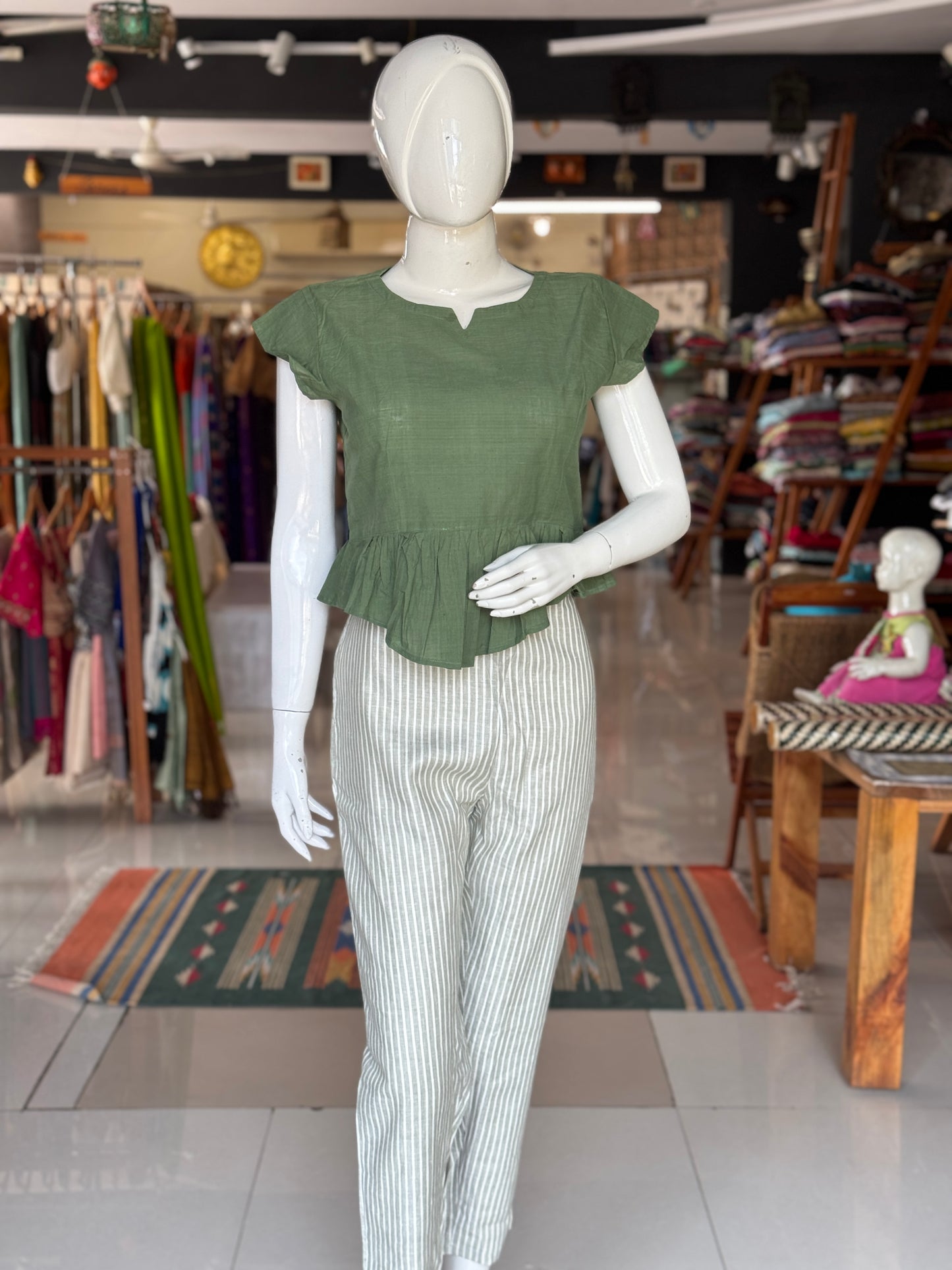 Green cotton handloom top with high low pleated hem