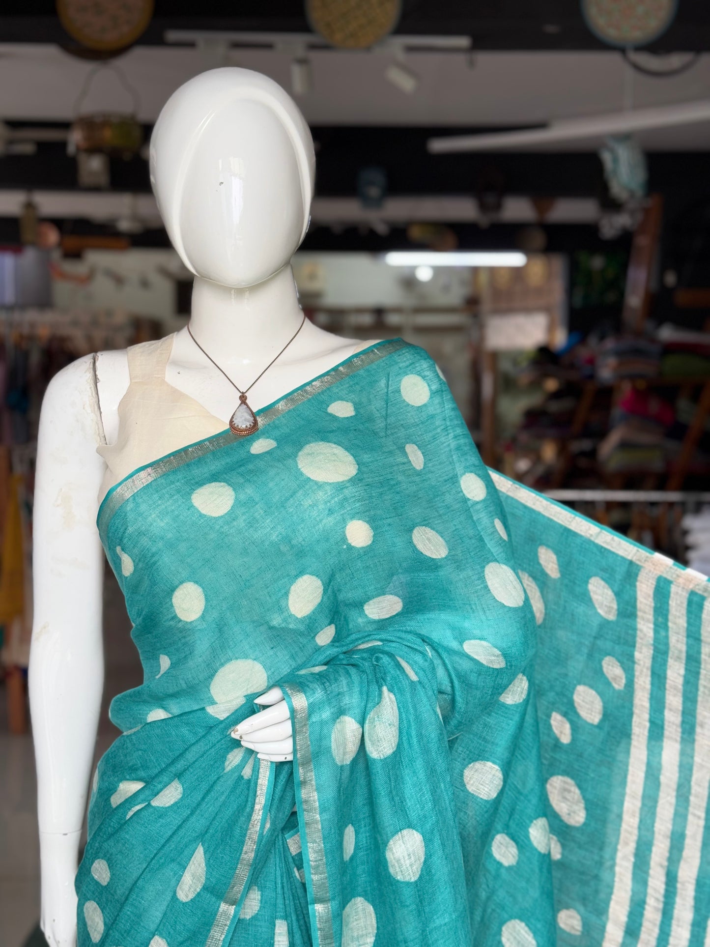 Sea green circles design hand batik linen saree