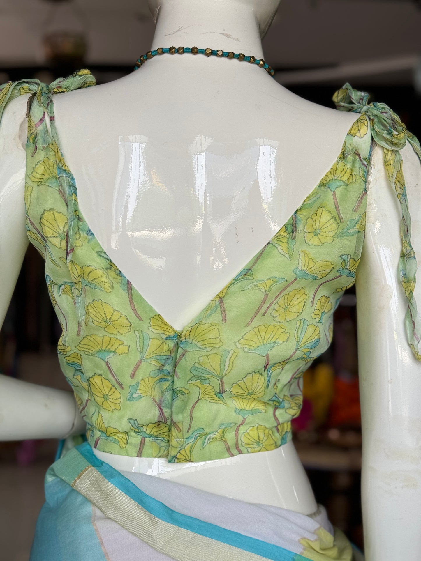 Green chiffon floral hand block printed tie up straps blouse