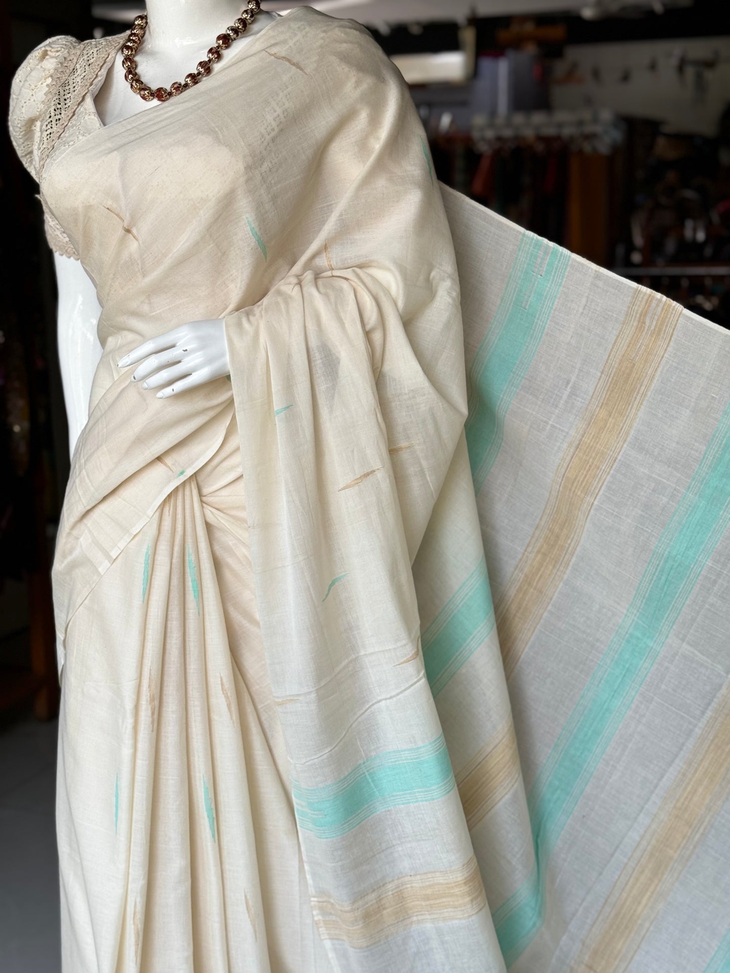 Offwhite pure soft cotton handloom saree with sea green and beige accents