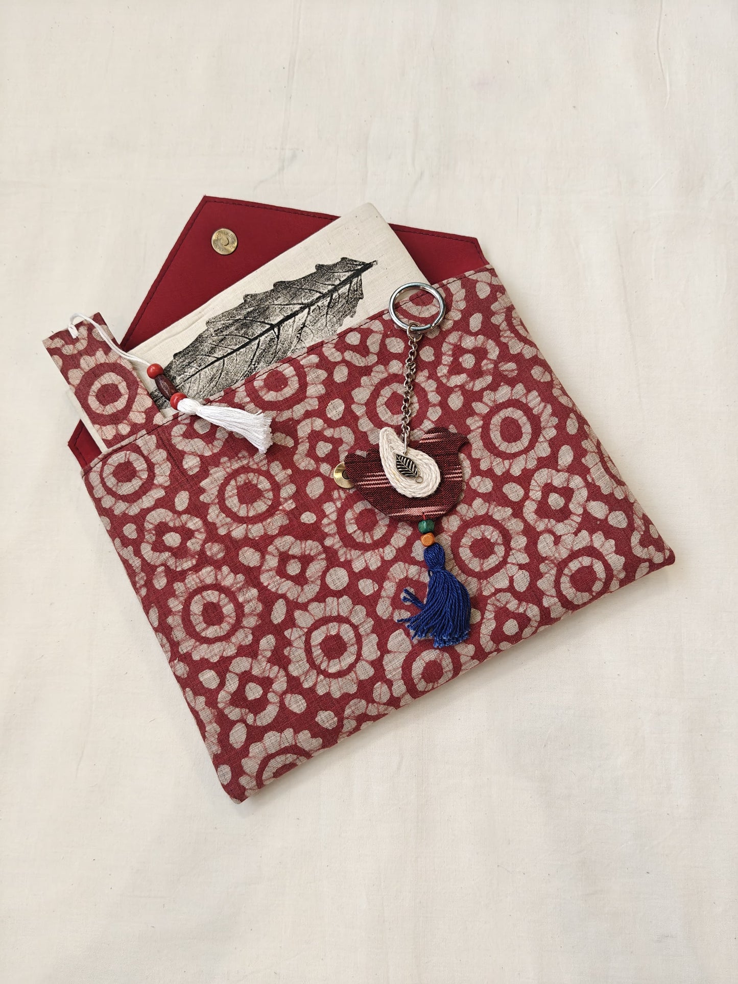 Handmade paper notebook with eco leaf printed fabric cover, hand crafted bookmark, key ring / charm and a container pouch set