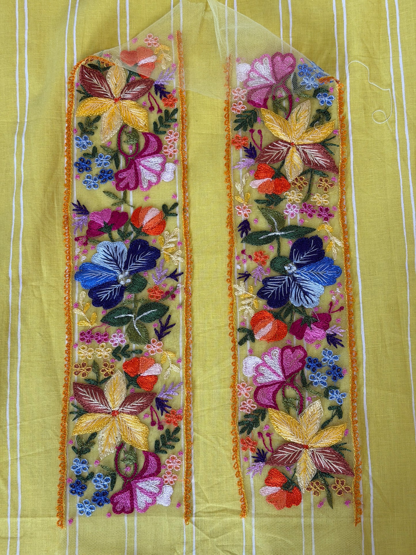 Yellow flowers and leaves embroidered patch border on yellow net base