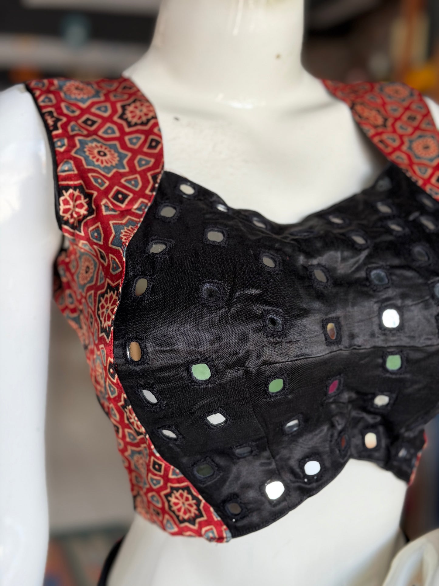 Ajrakh handblock printed Mashru sleeveless blouse with mirror embroidery - click to see colors