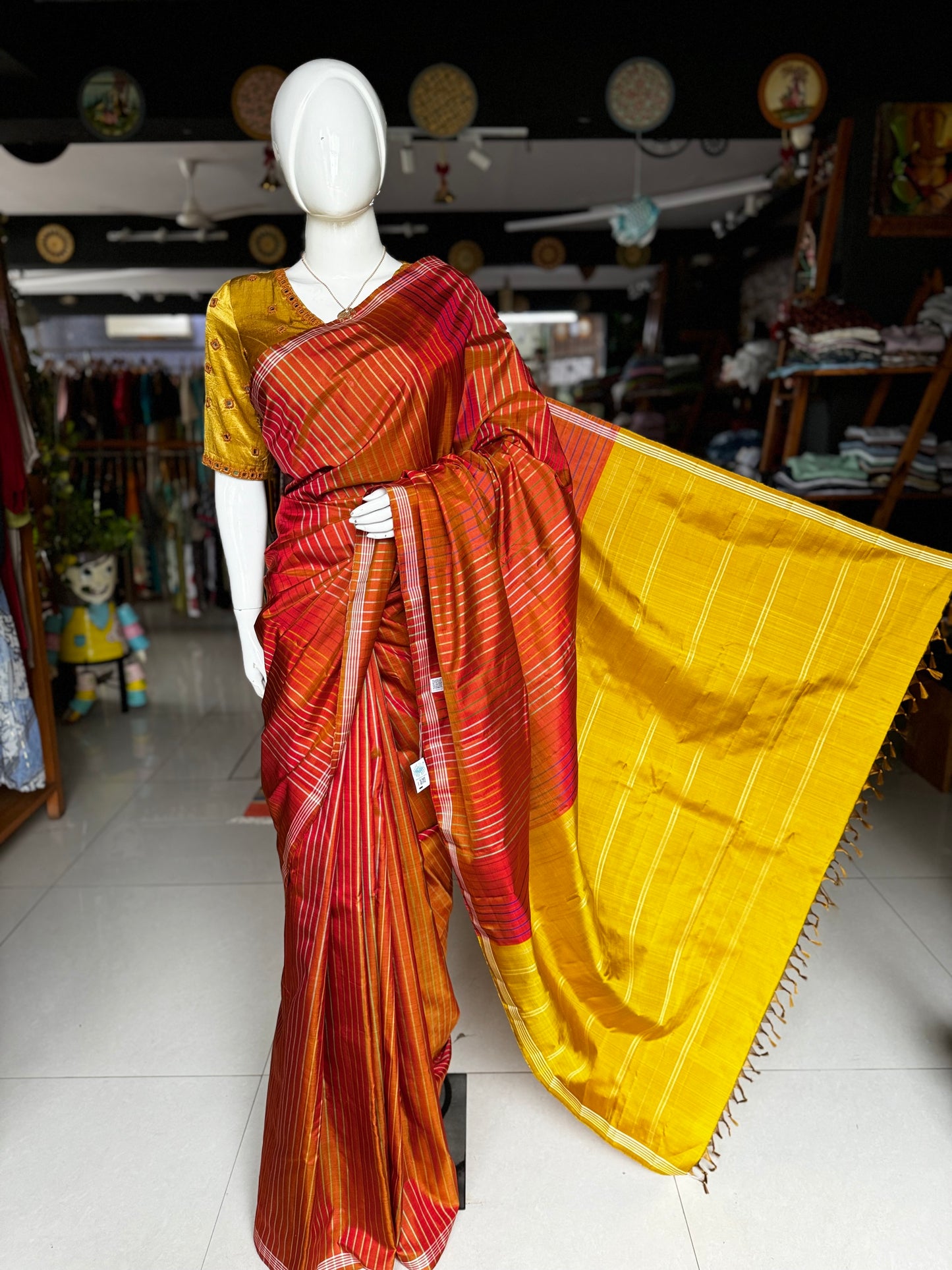 Orange pure silk handloom kanjeevaram pattu saree with multi colored stripes all over