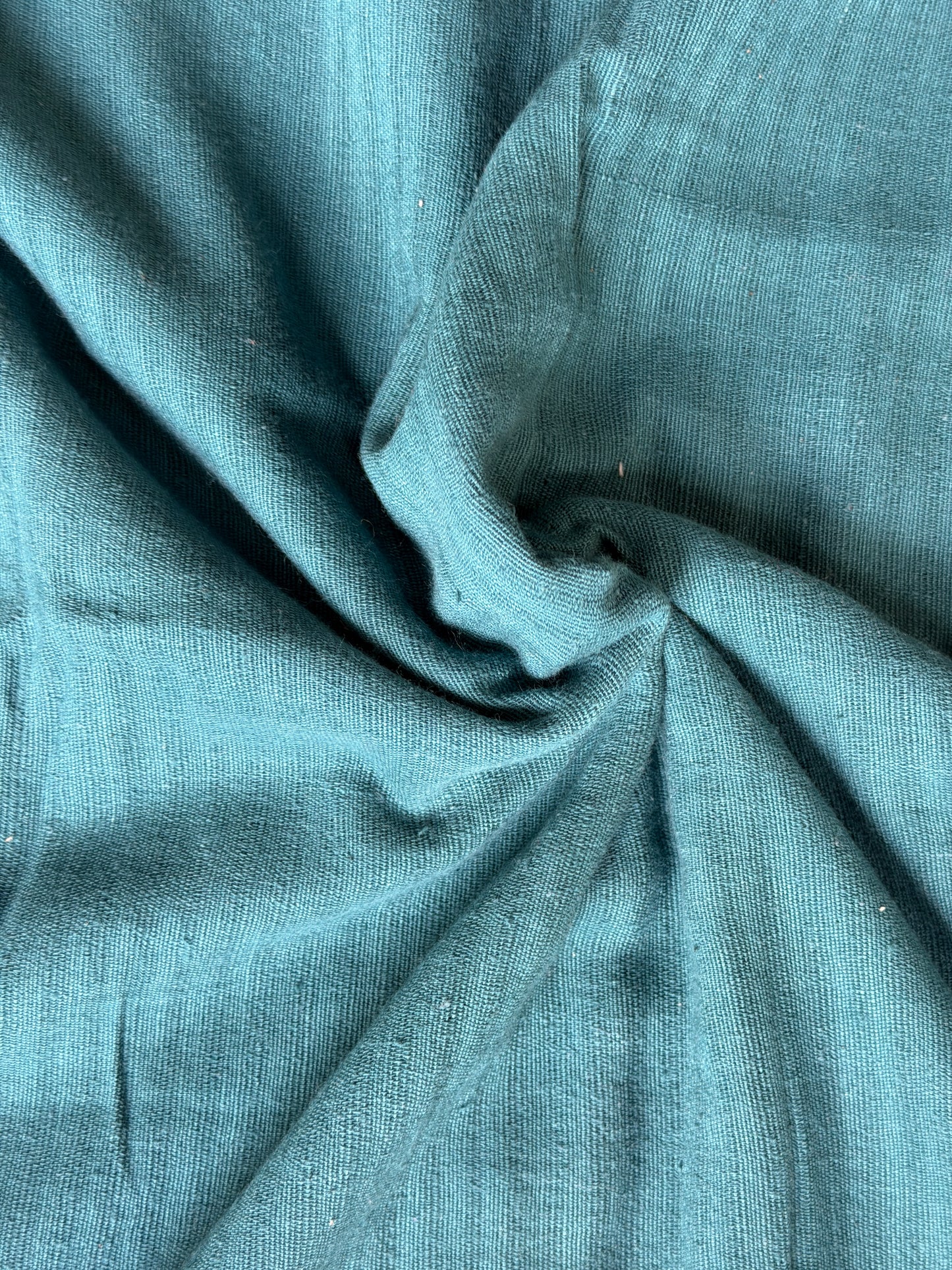 Teal blue cotton hand spun, hand woven fabric with missing thread stripes weave