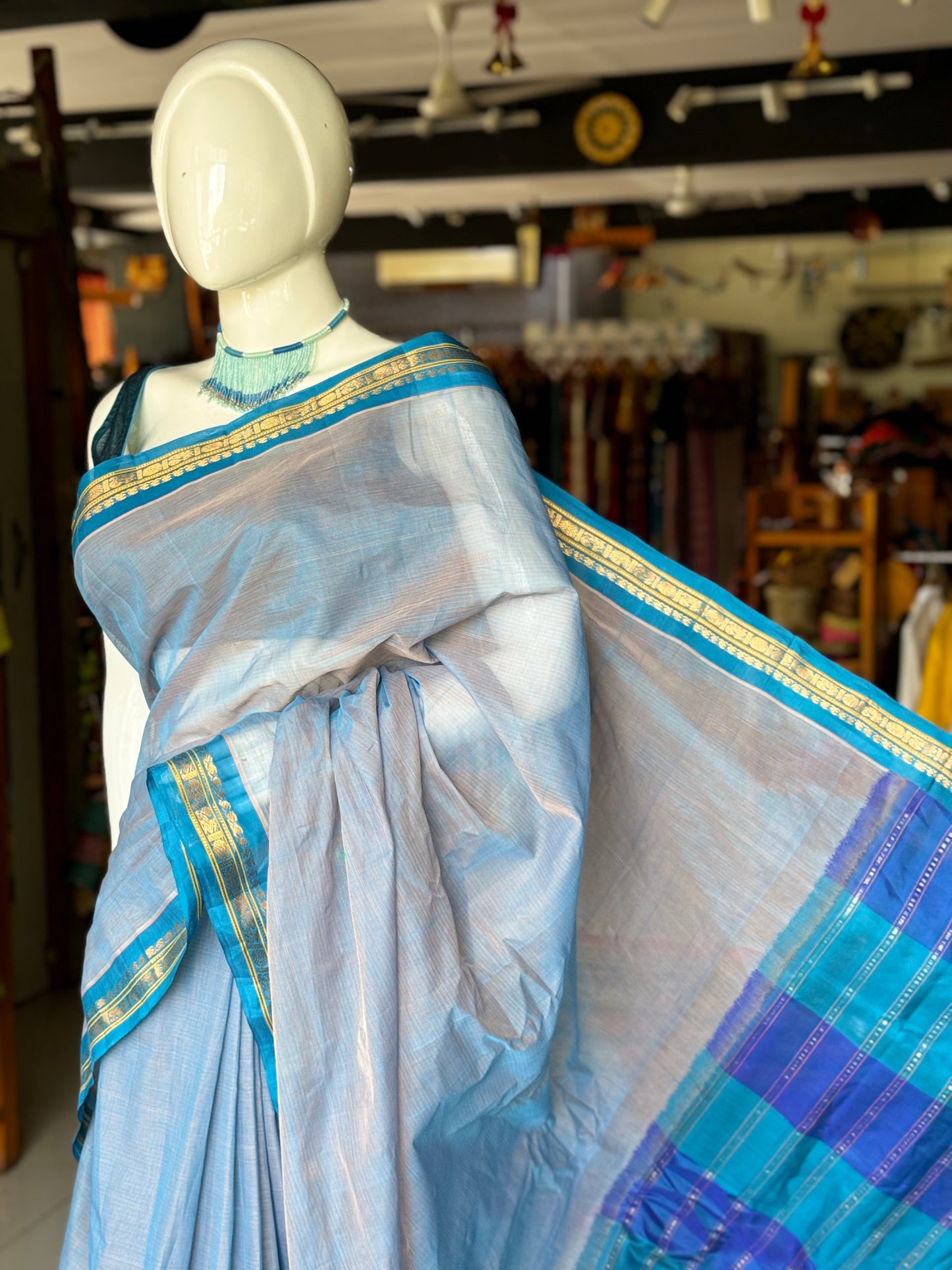 Blue handwoven Gadwal cotton saree with copper sulphate blue pure silk pallu and borders