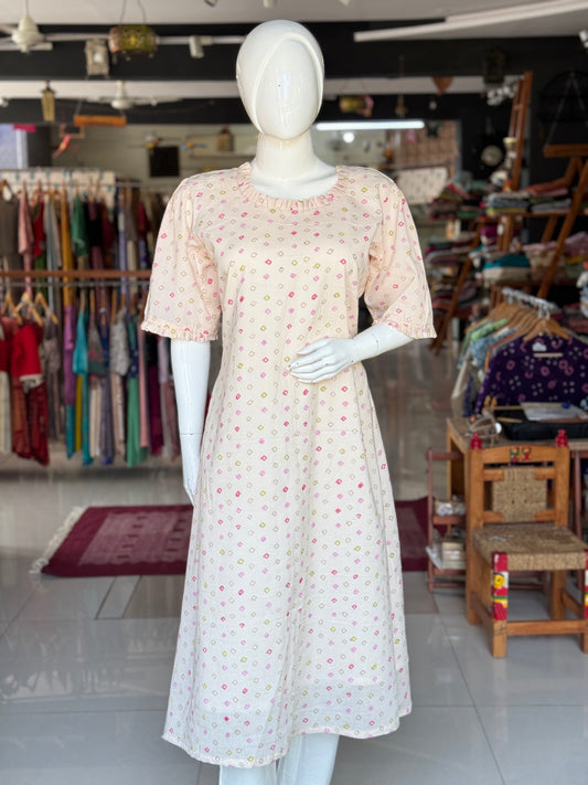 Diamond print light peach hand block perched cotton A-line kurti / dress with frill neck line