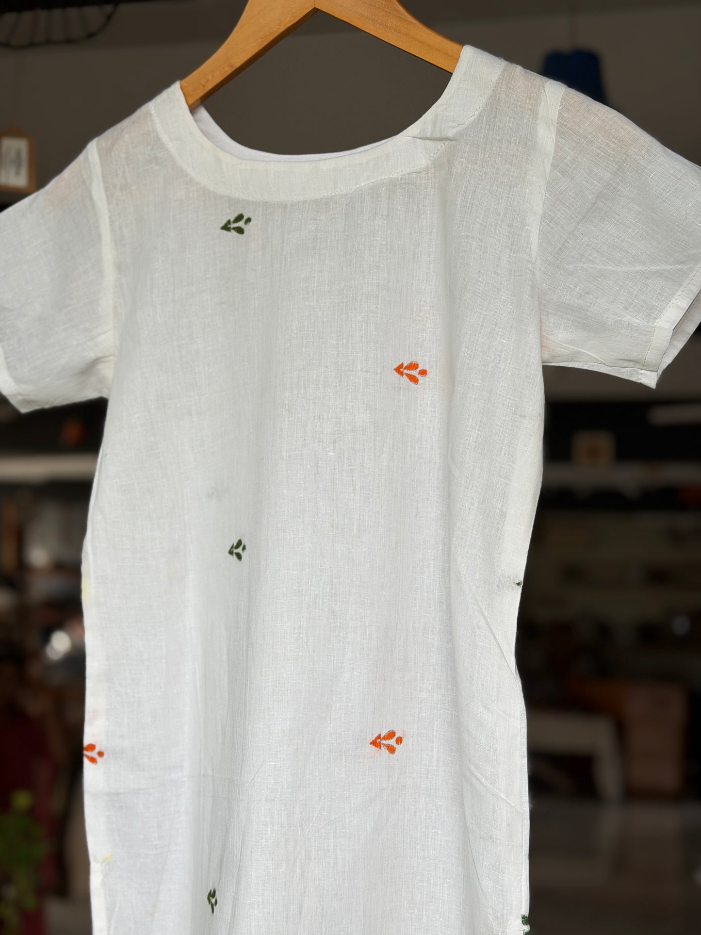 White cotton straight cut Kurti for girls with orange and green Kantha hand embroidery