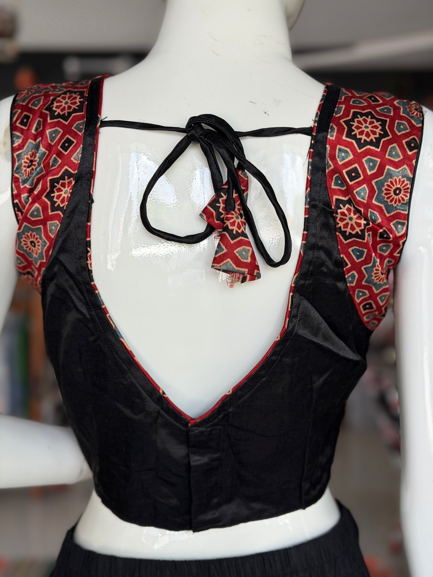 Ajrakh handblock printed Mashru sleeveless blouse with mirror embroidery - click to see colors