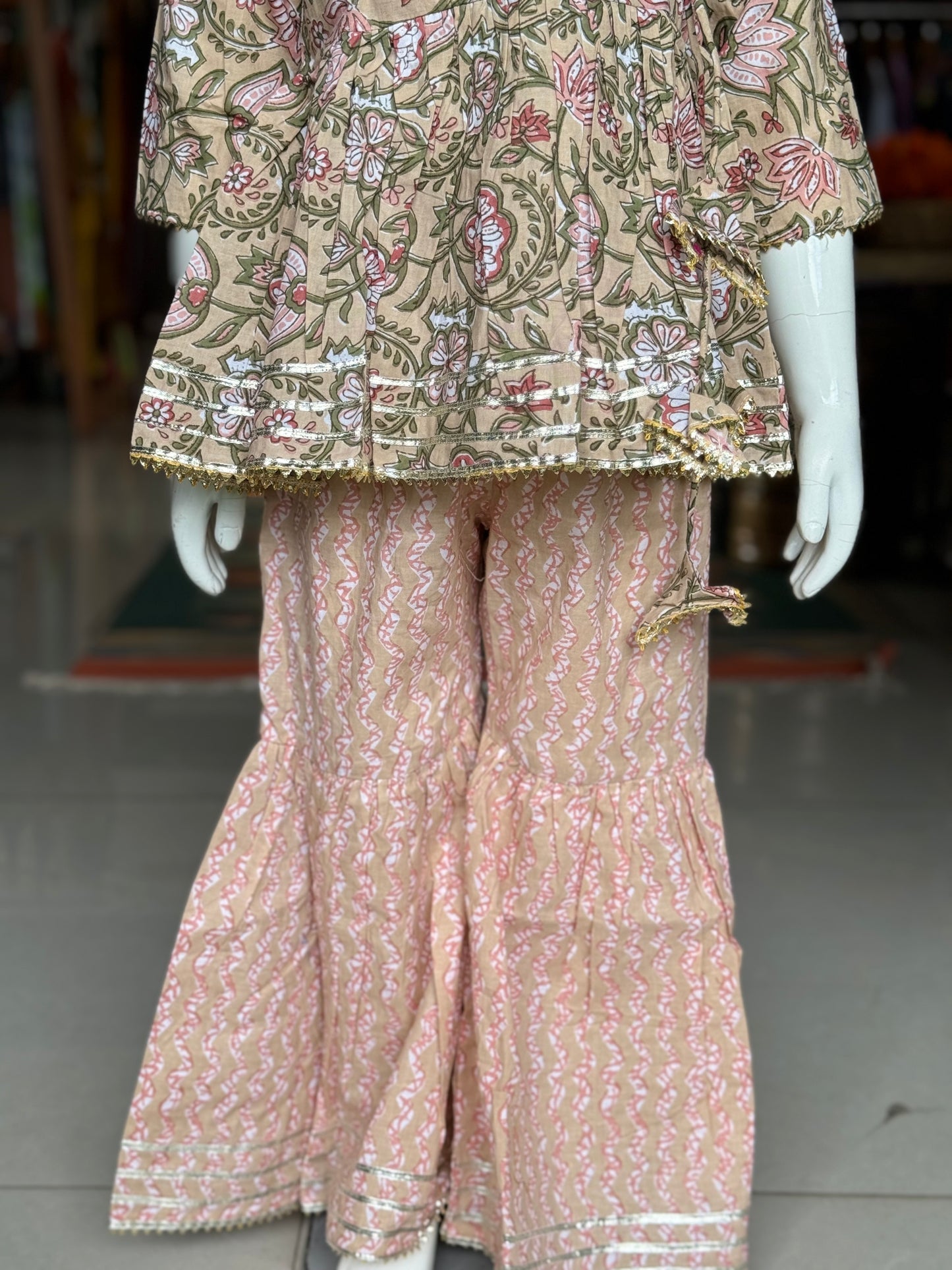 Angrakha style floral cotton short kurta and sharara pants set for girls with gota detailing