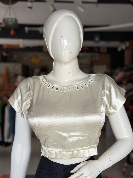 Off white mashru plain blouse with mirror work on front and back; pleated waist line