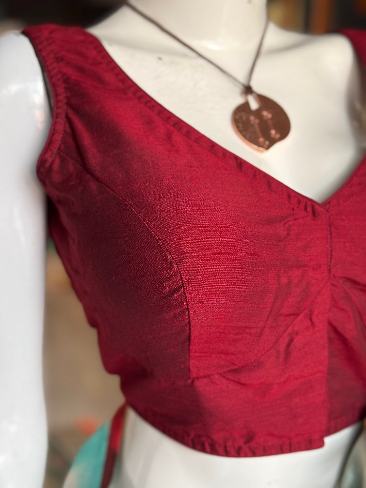 Maroon silk sleeveless padded back open blouse with lining