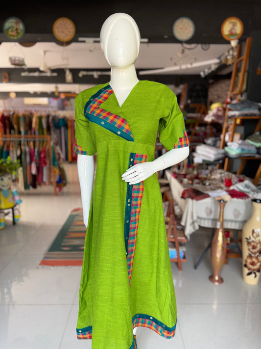 Green cotton dress with colorful madras checks and turquoise borders